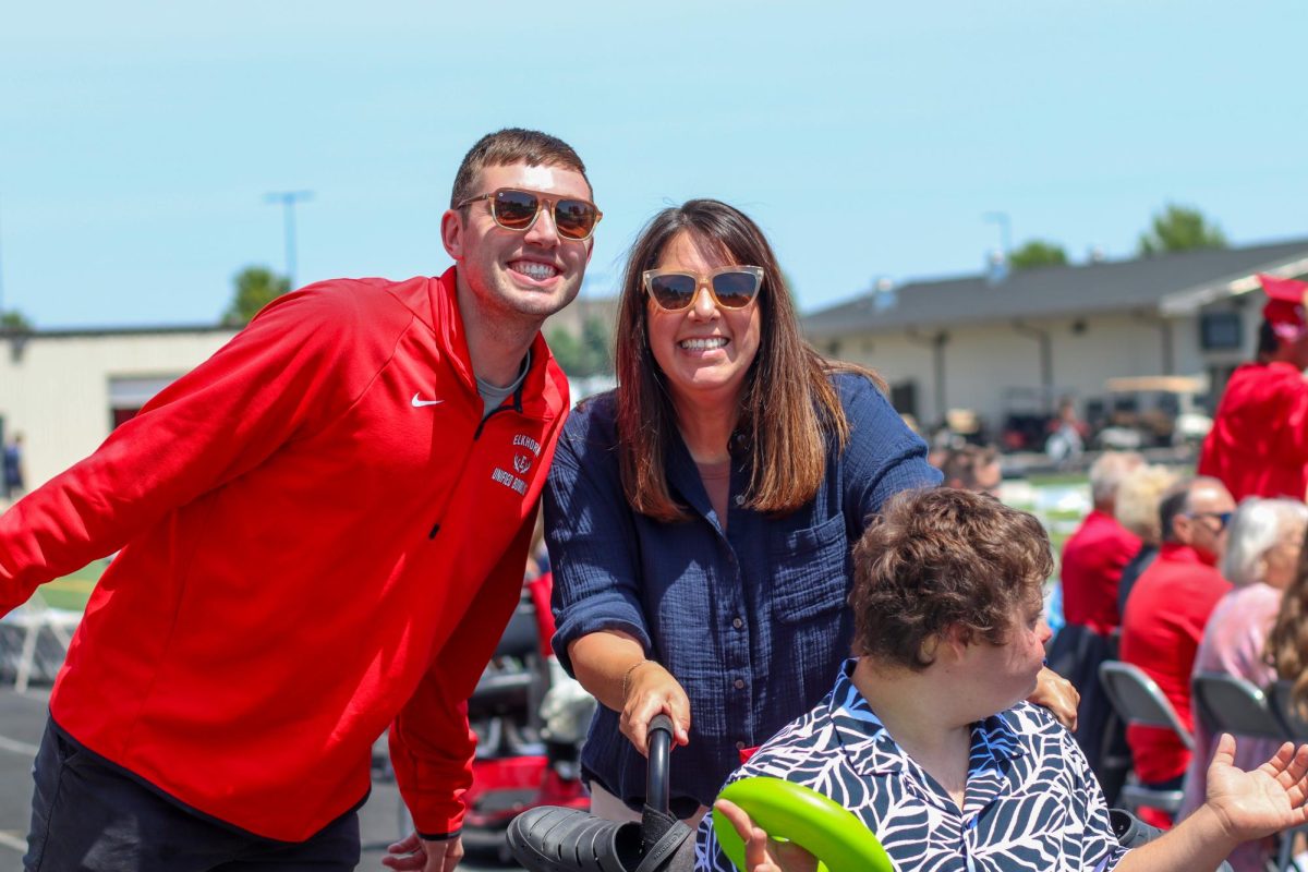 Hunter Grantham and Cortney Larsen  pose for a picture while they wait for Brady Dahl's turn. Graduation was held May 18th.