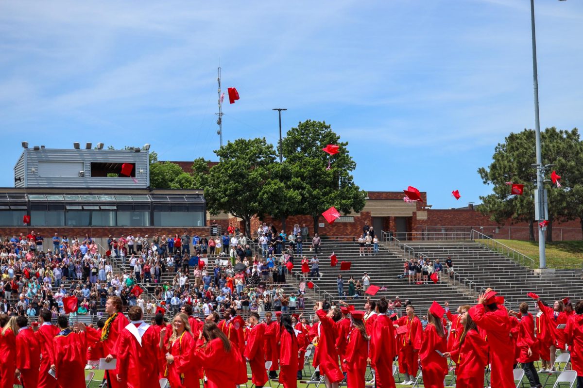 Elkhorn High Seniors become alums as they toss their caps in the air. Graduation was held May 18th. 