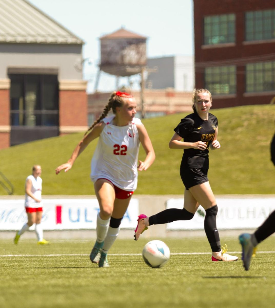 Junior Olivia Thompson looks for an opening against the Griffins. The Antlers lost at state 6-2 to Gretna East.