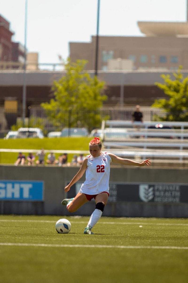 Junior Olivia Thompson drives a kick downfield during the state soccer game. The Antlers lost at state 6-2 to Gretna East.