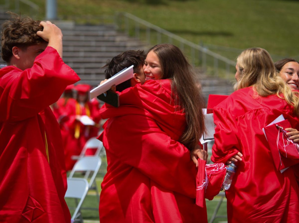 Luke Ludacka and Adriana Pagan hug after just having graduated high school. Graduation was held May 18th.