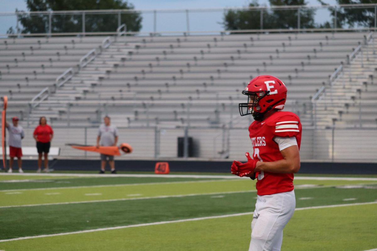 Senior, Camden Carle, prepares for the next play during the red vs. white scrimmage on August 22nd.