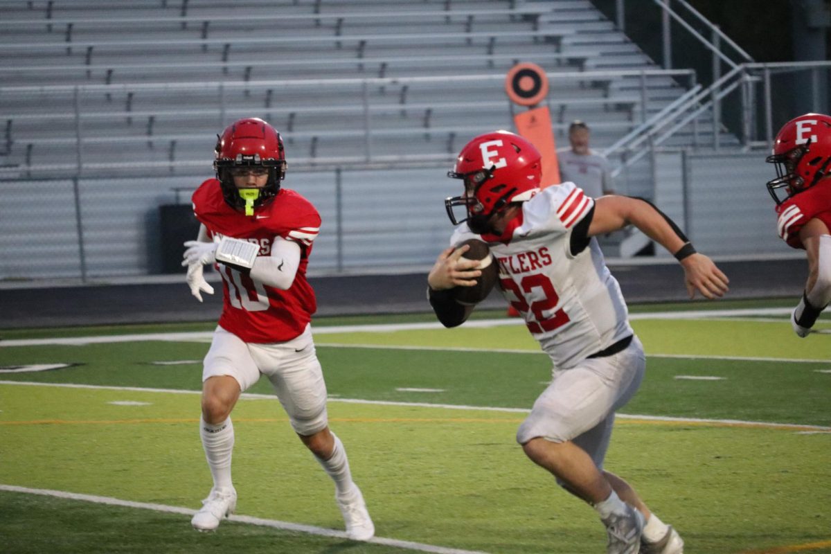 Wyatt Worlie blocks Cruz Westerlin in order to score at red and white scrimmage on August 22nd.