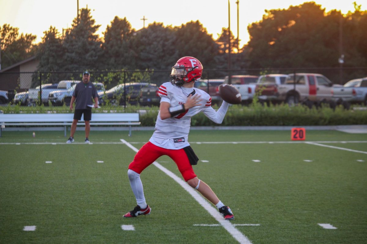 Freshman, Caedenn Moore, gets in position to throw the ball across the field in order to score. The Antlers played the Gretna Dragons on Thursday August 28th.