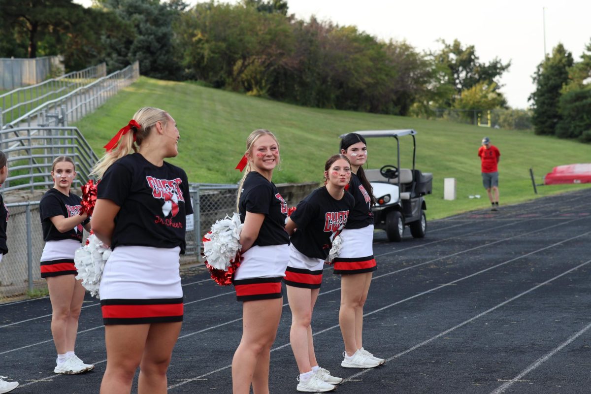 the cheer team at the red and white scrimmage