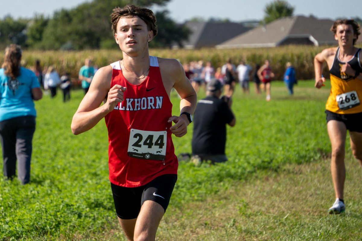 Sophomore Brayden Romero runs past a competitor at the Beatrice Cross Country Invite, Sept. 6. The Antlers took home the team title at the meet.
Photo courtesy of Mr. Stednitz