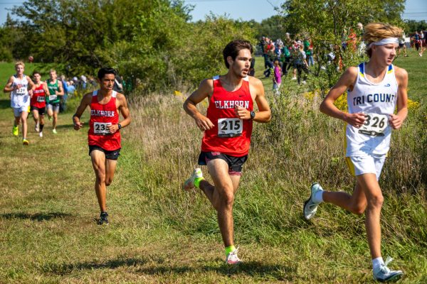 Senior Garrett Barerras moves to pass another runner at the Beatrtice Cross Country Invitational. Both the boys and the girls teams finished as meet champions.

Photo courtesy of Mr. Stednitz