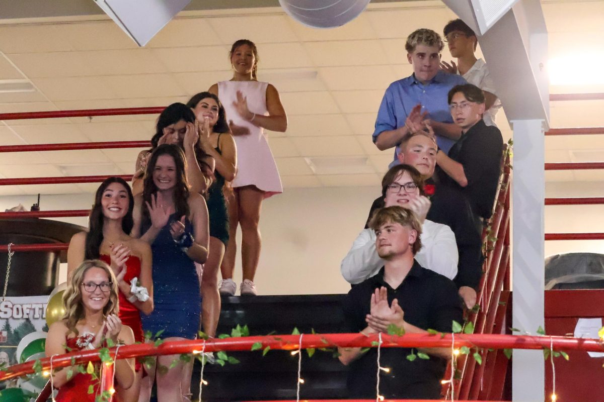 Homecoming court waits to hear who will be homecoming king and queen. Homecoming took place on Sept. 20th, 2025.