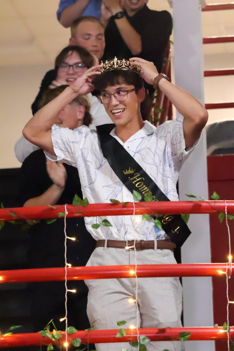 Senior Finn Hartman smiles after being crowned homecoming king. Homecoming took place on Sept. 20th, 2025. Senior Megan Erdkamp was crowned homecoming queen.