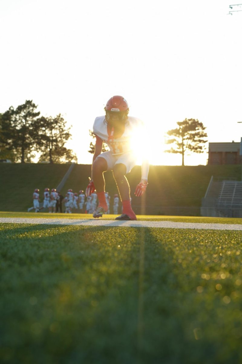 Sophomore, Isaiah Herchenbach, warming up before the game vs Elkhorn North. 