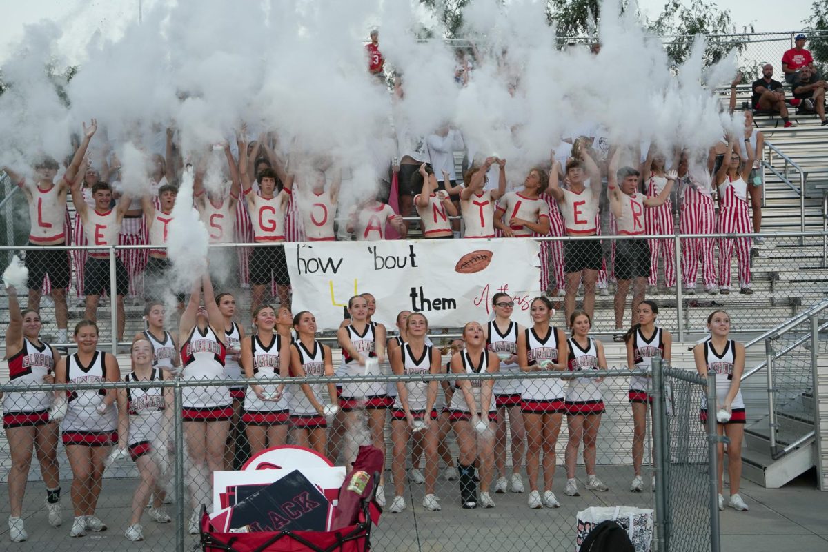 Elkhorn Antlers student section throwing baby powder at the time of the kickoff during the Elkhorn High vs. Elkhorn North game. 