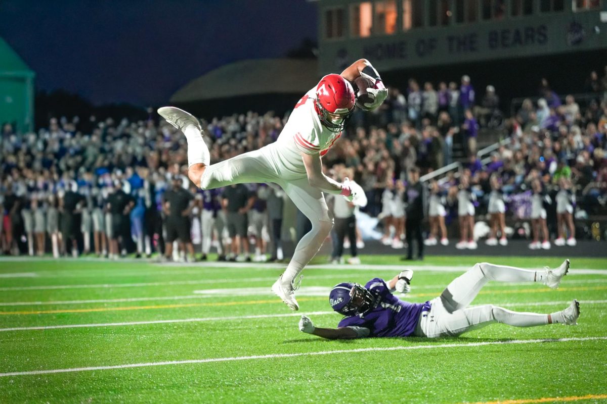 Senior Reid Stec dodges a tackle and runs into the end zone for an Antler touchdown. Elkhorn lost to Blair 14-13.