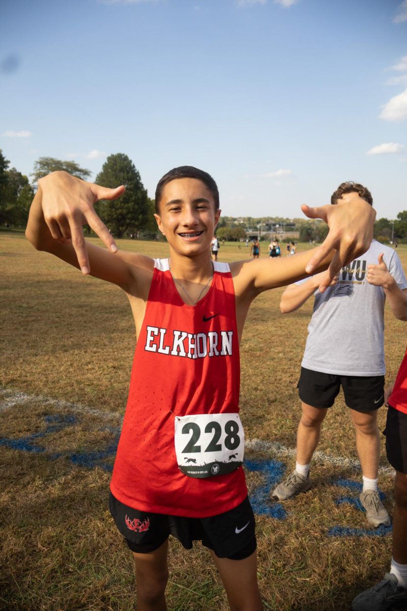 Freshman Isaac Fernandez posing for a picture at the start line of the 2025 Boys Town Invitational. Fernandez would end up finishing with a time of 21:39 at the invite.