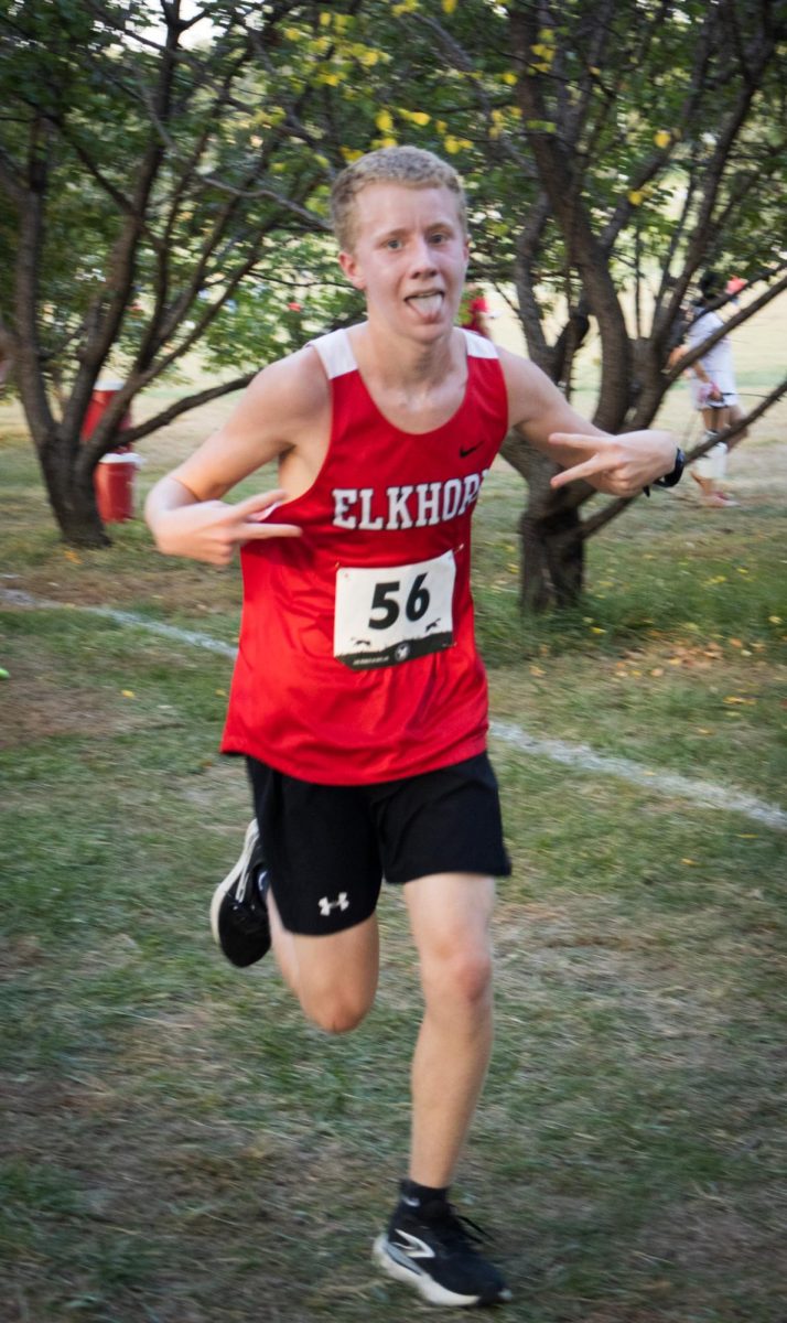 Sophomore Brenden Fisher posing for the camera during his third kilometer of his Boys Town Invite 5k race. Fisher would end up running a final time of 22:12 at the invite.