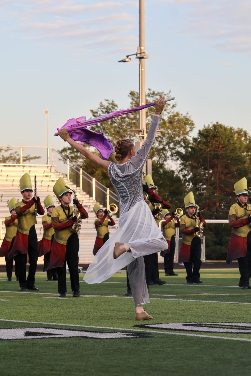 Sophomore Evan Carlson performs duet on the sounds of excellence field. Elkhorn marching band performed on Oct. 11th, 2025.