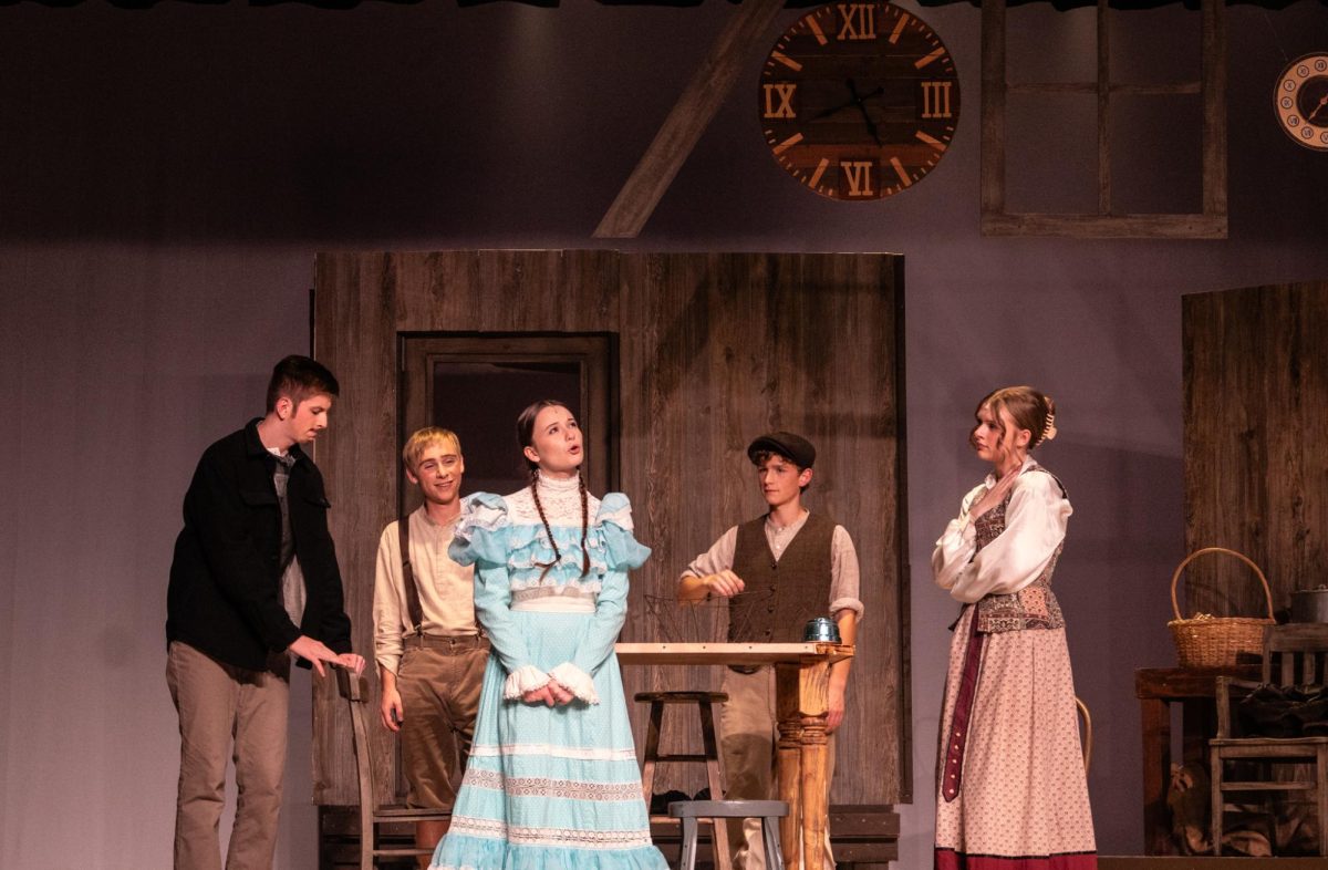 The Tuck Family and Winnie comprised of seniors Nora Cowles, Gage Petrick, Christian Vendetiti, and sophomores Trevor Gross and Rylee Loontjer.