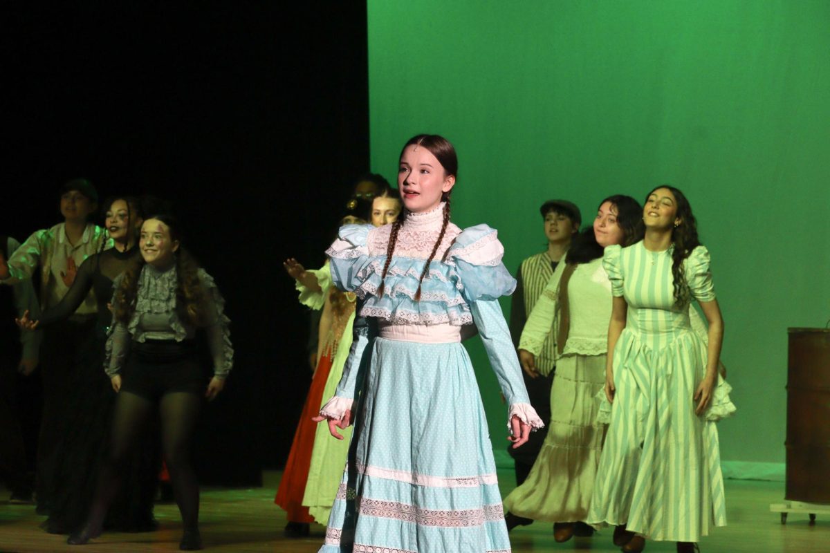 Nola Cowles sings as Winnie Foster in the musical "Tuck Everlasting."