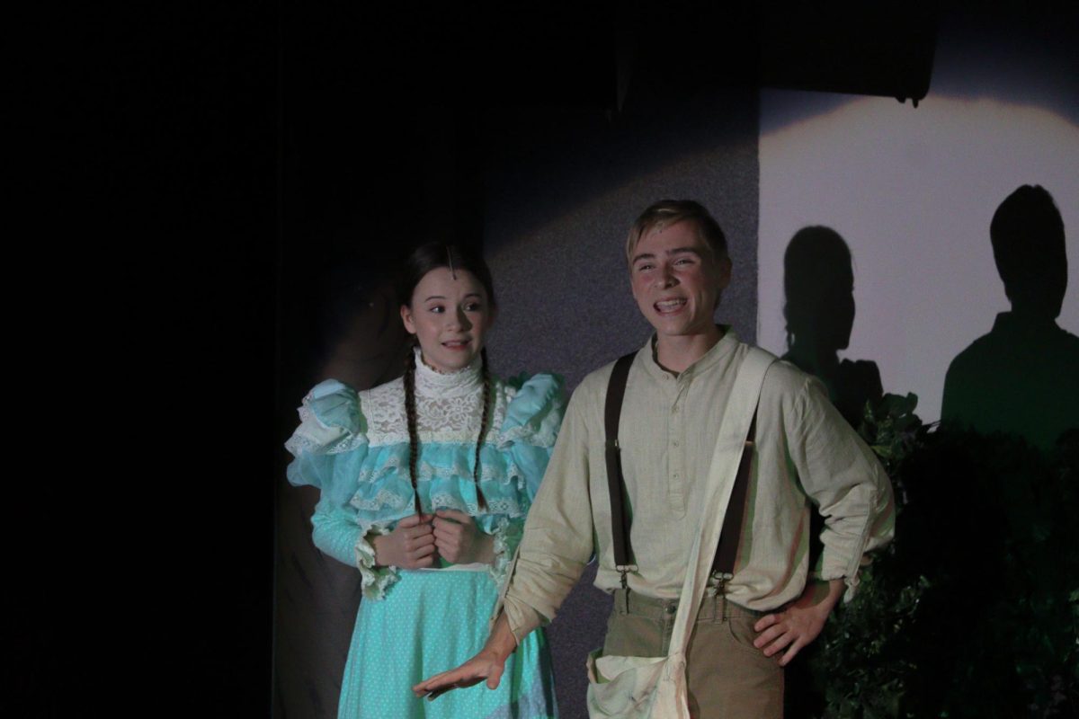 Gage Petrick sings to Nola Cowles from a tree in "Tuck Everlasting."