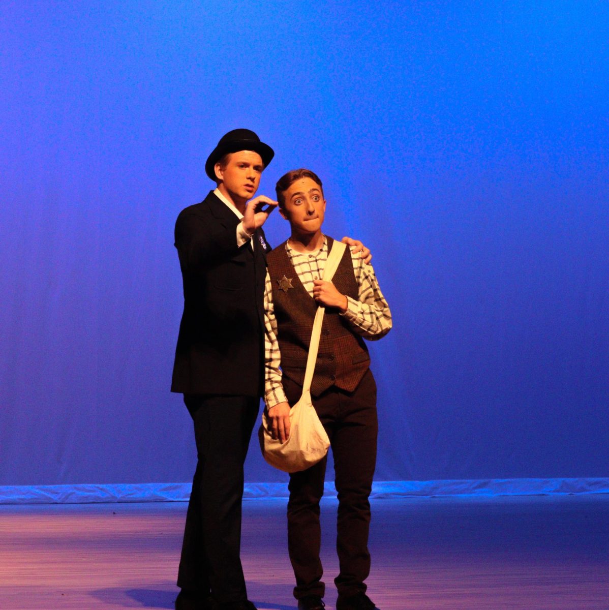Juniors Kaleb Paulson and Blake Warren play detectives in "Tuck Everlasting."