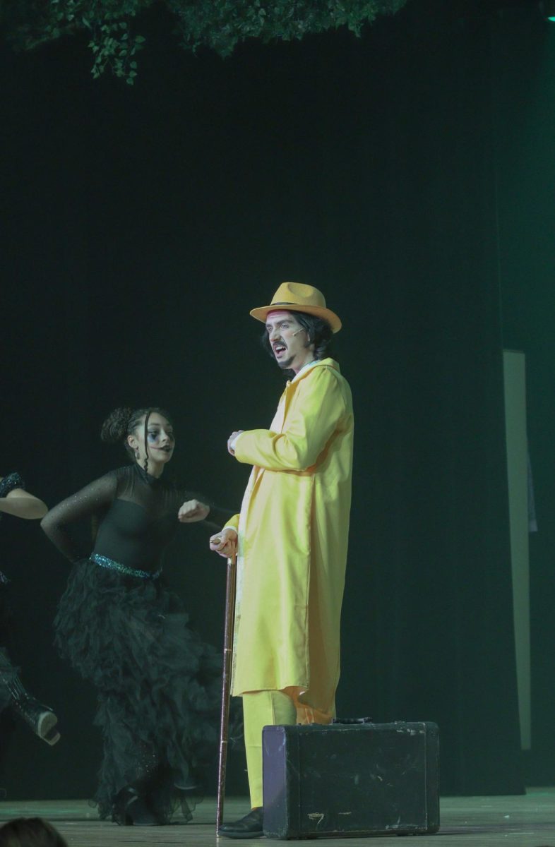 Senior Taylor Kohn plays the role of the mysterious, unnamed fair worker in "Tuck Everlasting."