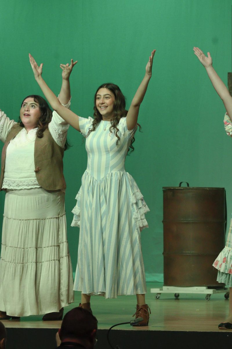 Juniors Kyla Burhan and Sara Contreras dance in "Tuck Everlasting."