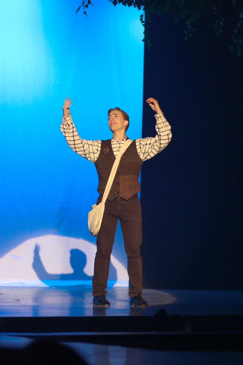 Junior Kaleb Paulson sings as  detective Hugo Jackson in Tuck Everlasting.