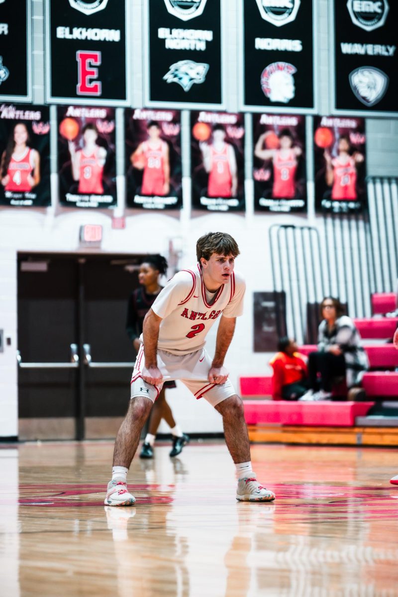 Senior Charlie Griffith sets up to play defense against Skyler. Griffith was honored at the end of the season with an award named after him.