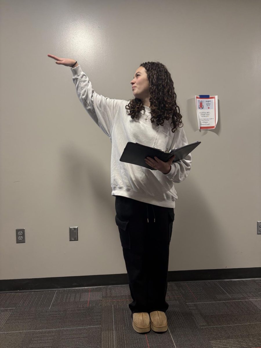 Sophomore Gianna Panebianco Acts out her Poetry Program.