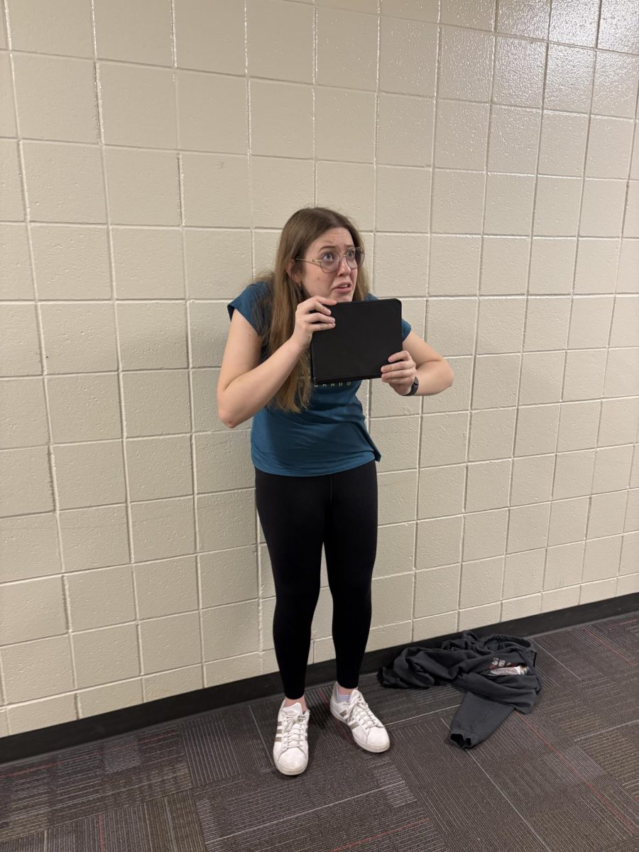 Senior Ellie Cain practices her Program of Oral Interpretation.