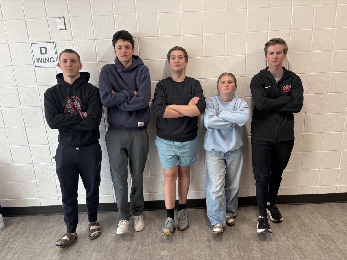 Pierce Lundgren (center) chills with his squad, from left to right, Tom Hensley, Cooper Hart, Eliza Underwood, and James Ahern.