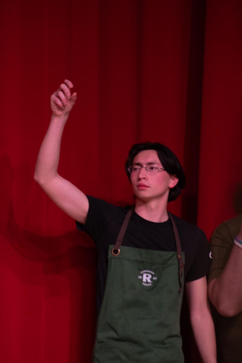 Senior Ivan Ratnapradipa frat flicking on the stage for Mr. EHS 2026.