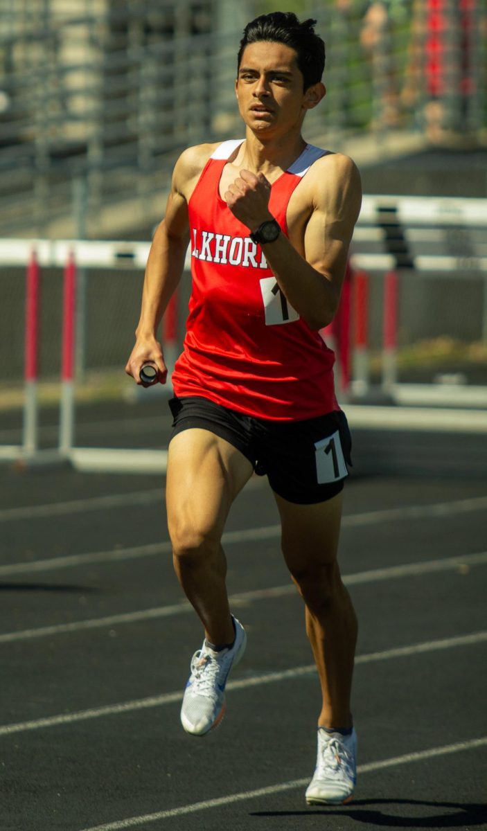 Junior Gerardo Hernandez-Tapia runs the Boys 4x800 meter relay at the 2026 Kruger May Track Invite at EHS, April 16, 2026.