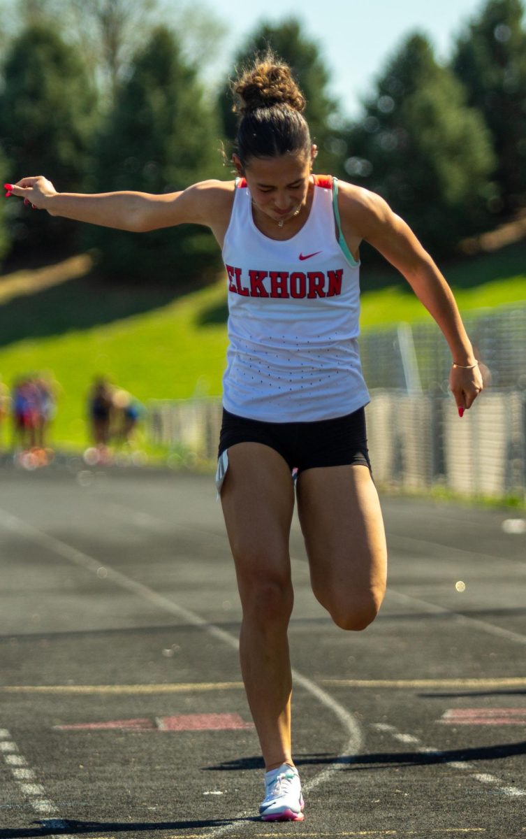 Sophomore Mia Cushing crosses the finish line of the 100 meter dash at the 2026 EHS Kruger May Track Invite, April 16, 2026.