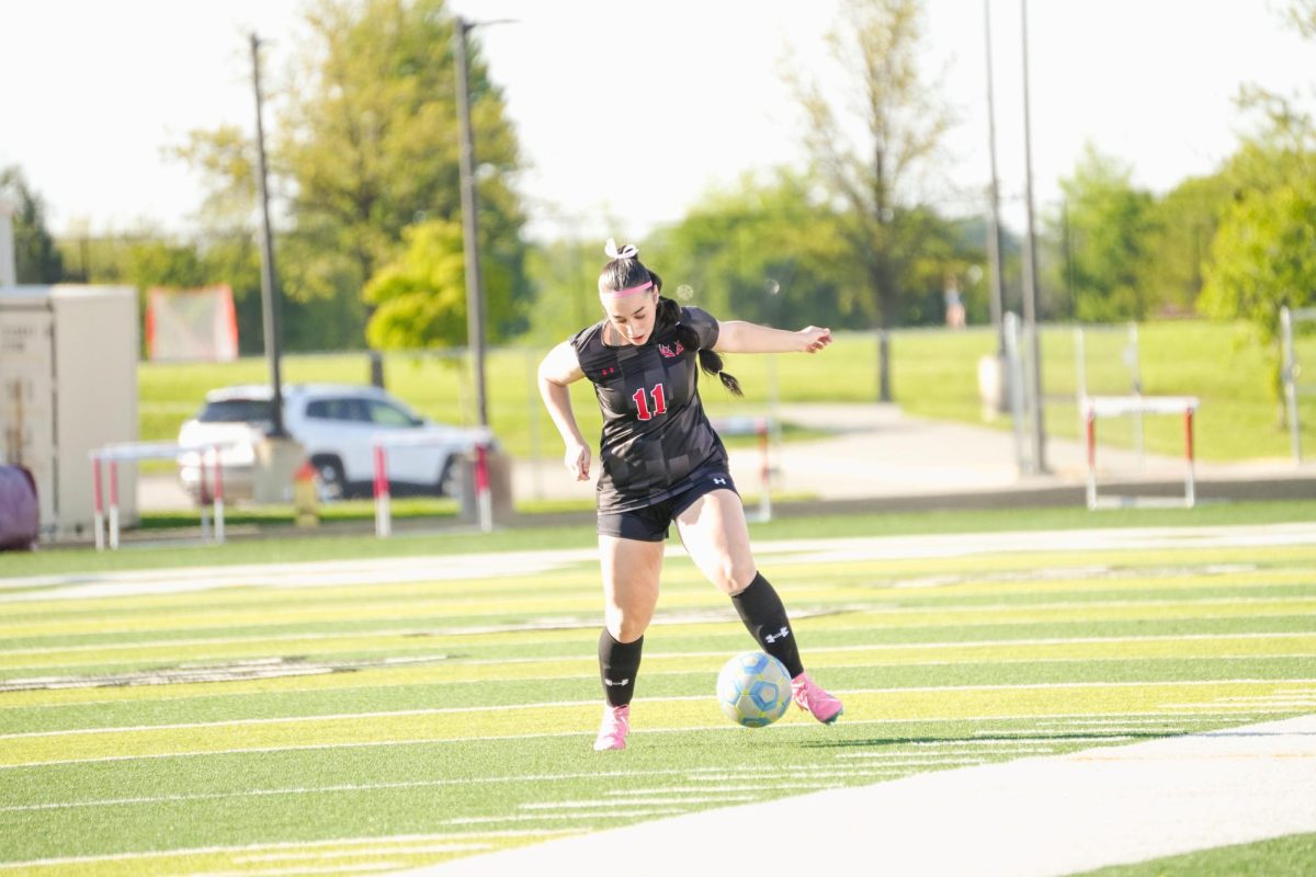 Junior, Lulu Lary, controlling the ball to take it down the field and generate offense for the Antlers. 