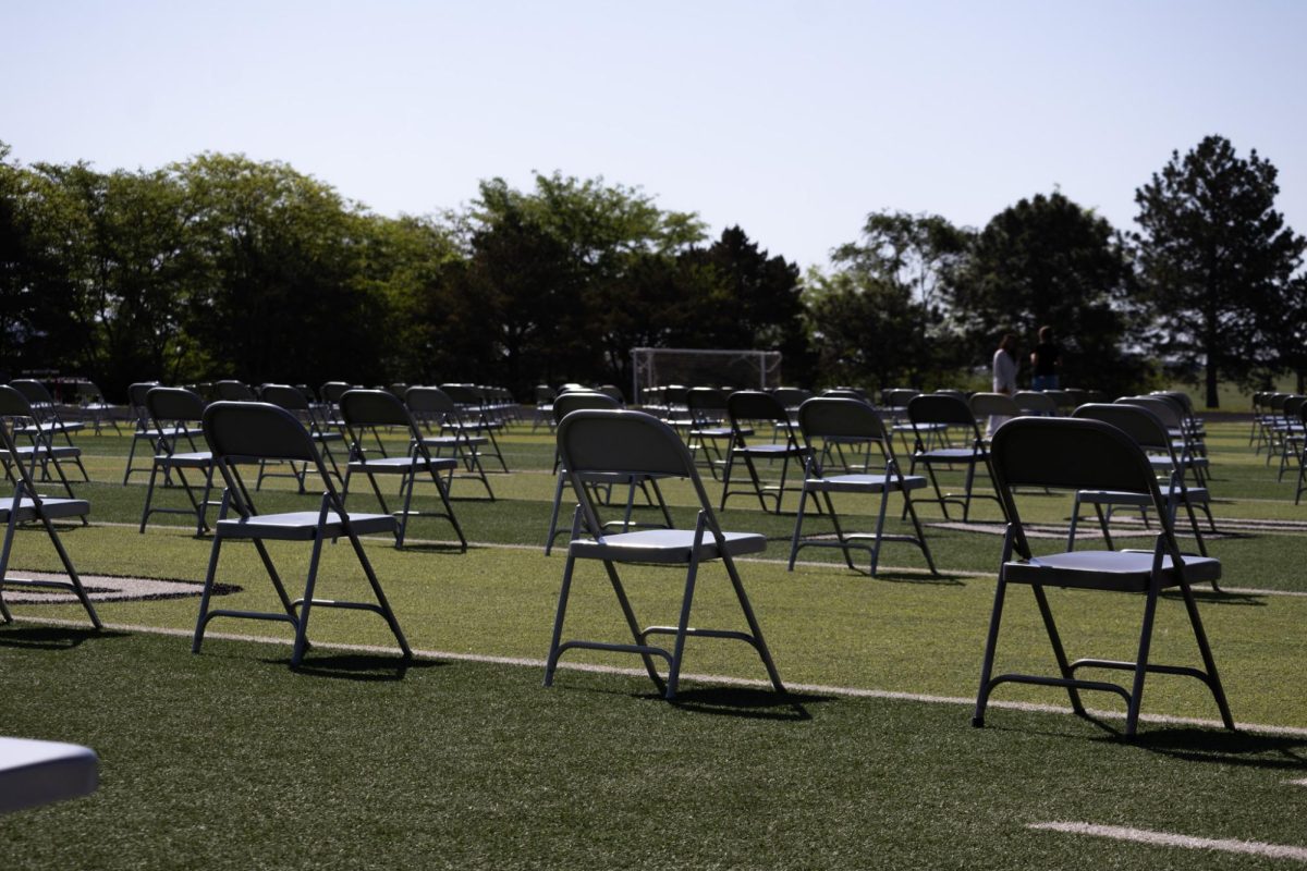 Chairs are set up in a grid pattern for graduation this Sunday. There is a possibility it will be moved inside due to weather.