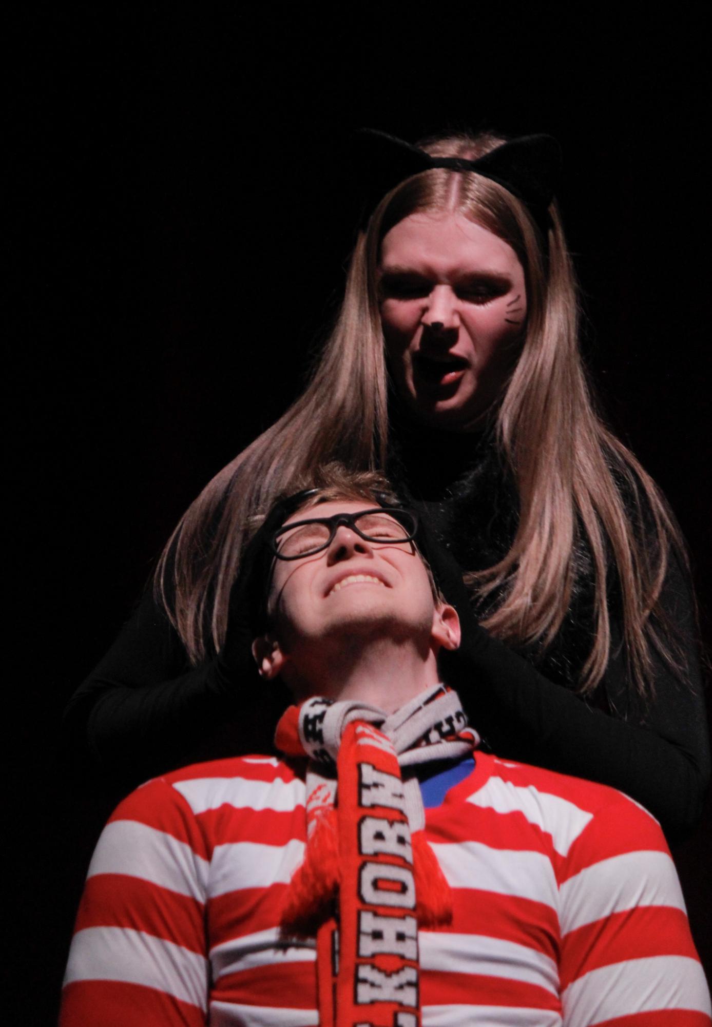 Panther lady, played by sophmore Rylee Loontjer, and Waldo Puppybreath, played by senior Taylor Kohn are in the midst of a dispute. Captain Fantastic is showing in the EHS Auditorium May 1-3.
