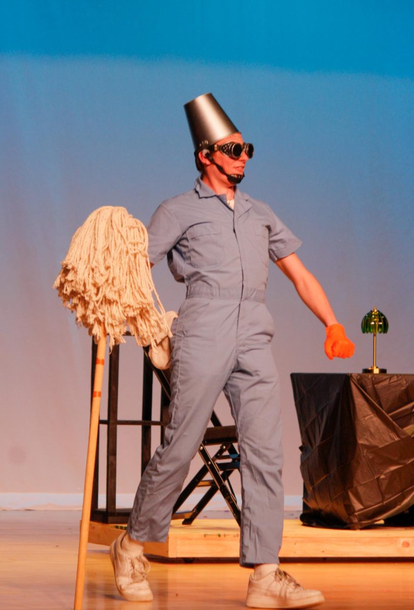 Buckethead, played by junior Connor Cumerford is taking his place with the Wonder Heroes. Captain Fantastic is showing in the EHS Auditorium May 1-3.