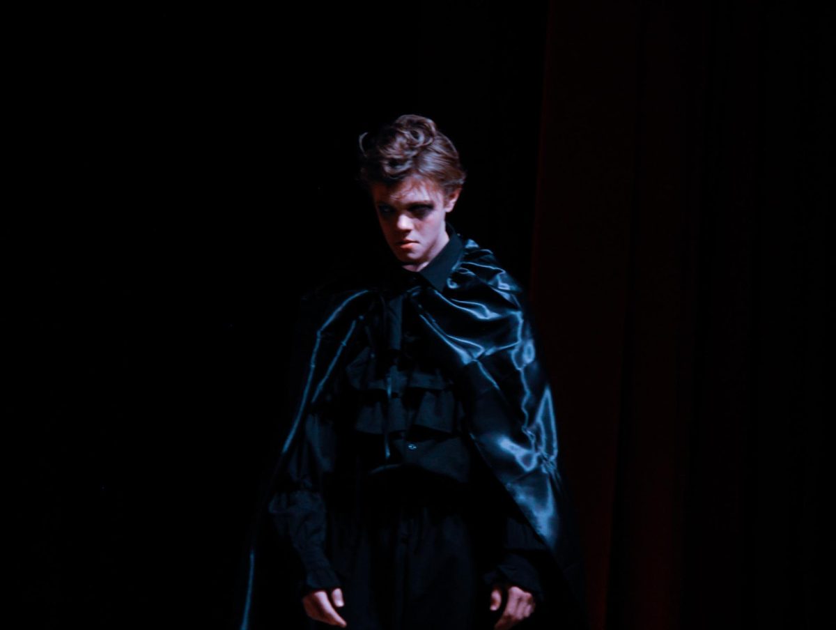 The Ink Blot, played by sophmore Camden Kieckhafer is debating his next move in Elkhorn High's spring play, Captain Fantastic. Captain Fantastic shows May 1-3 in the EHS Auditorium.